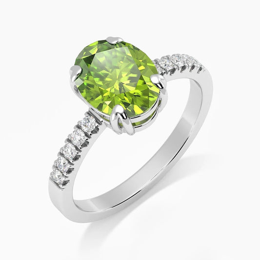 Side view of Oval Peridot Silver Ring with Halo Shank and CZ Side Stones