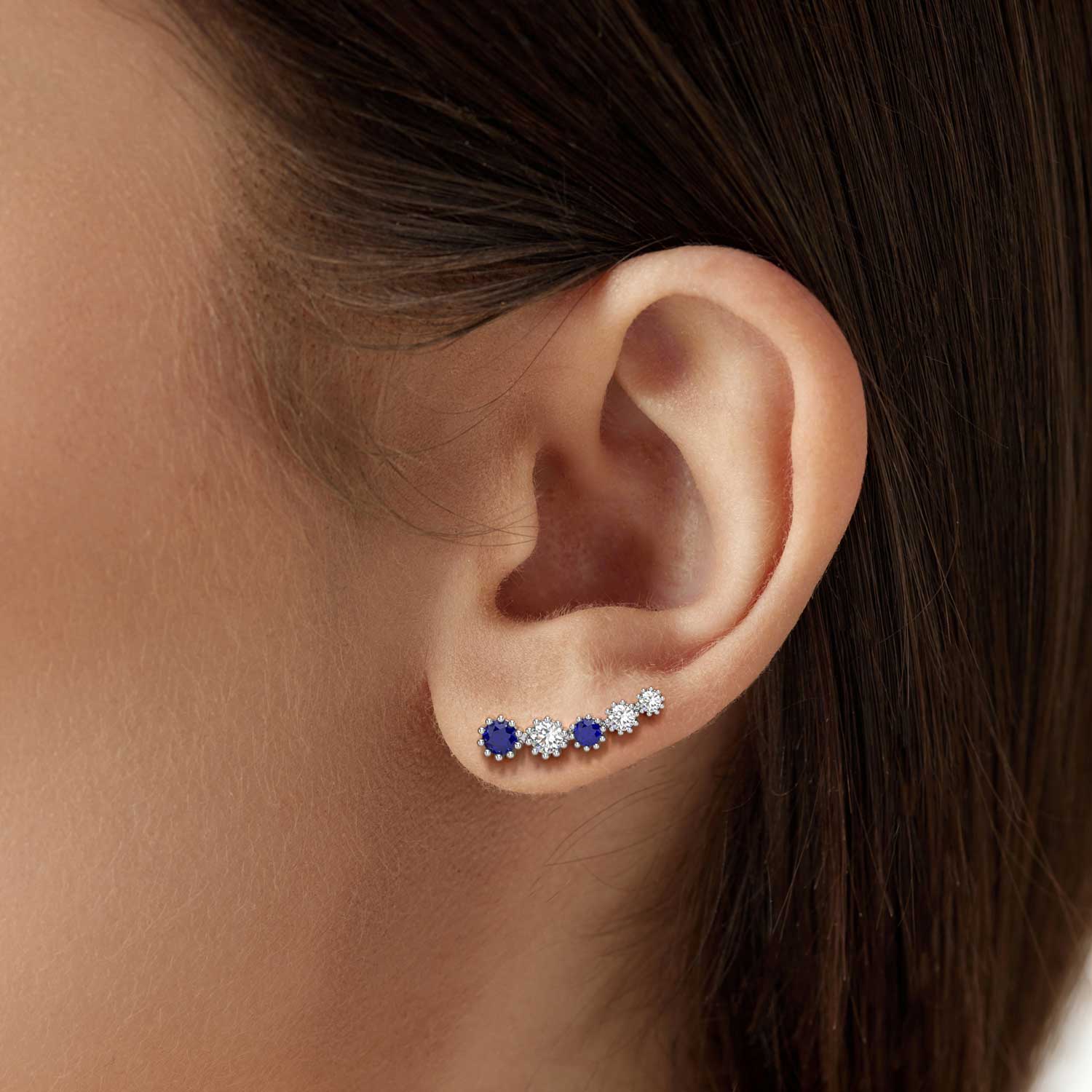 sapphire earrings climbers on model