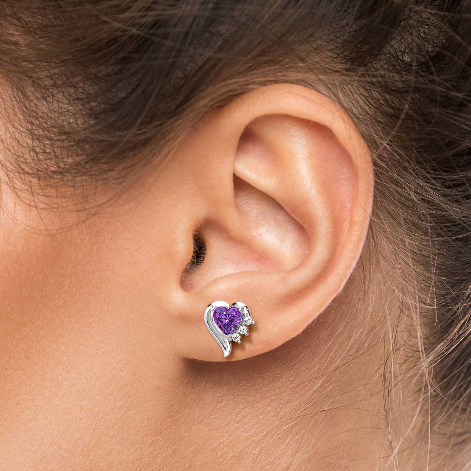 amethyst earrings on model ear