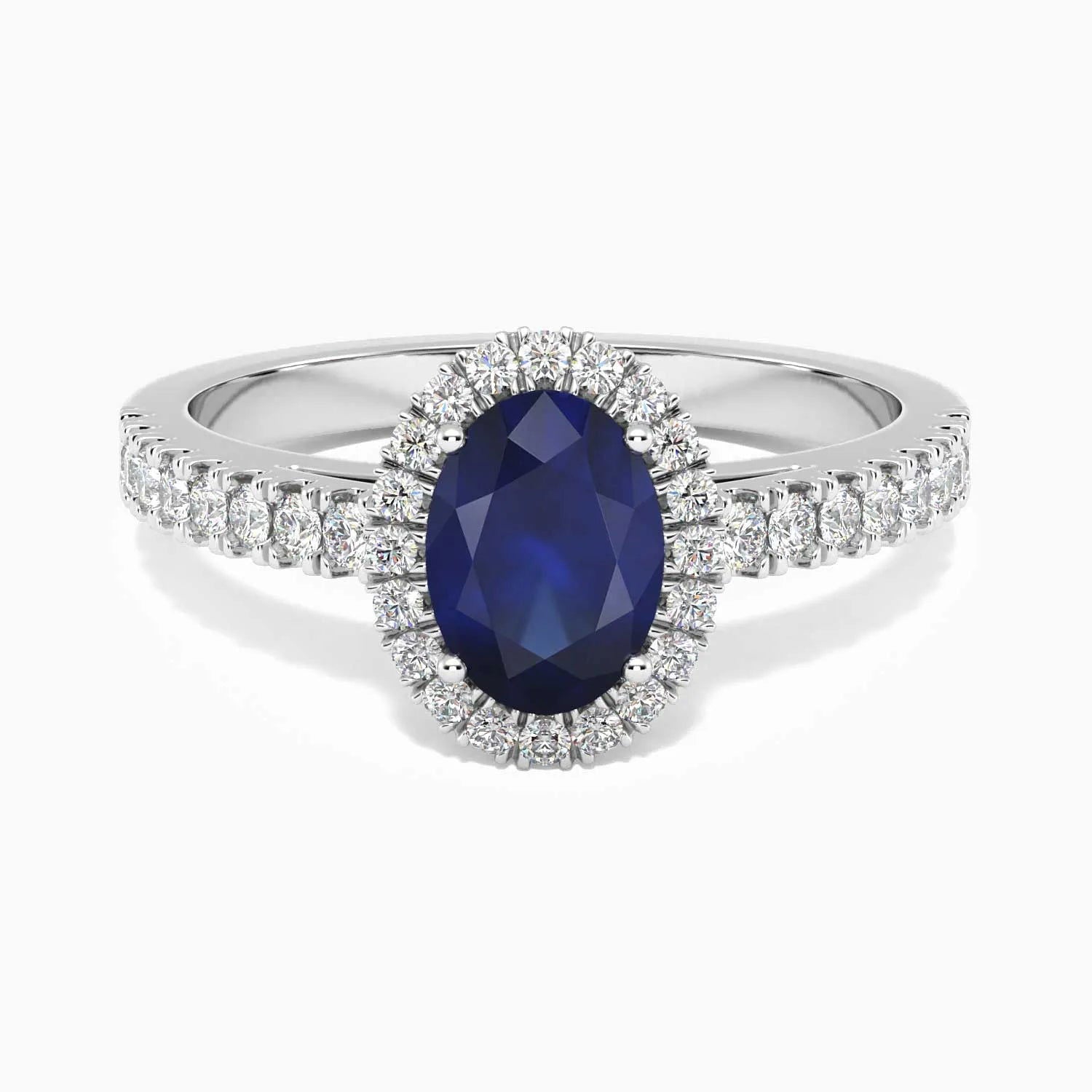 Classic oval sapphire halo ring in sterling silver