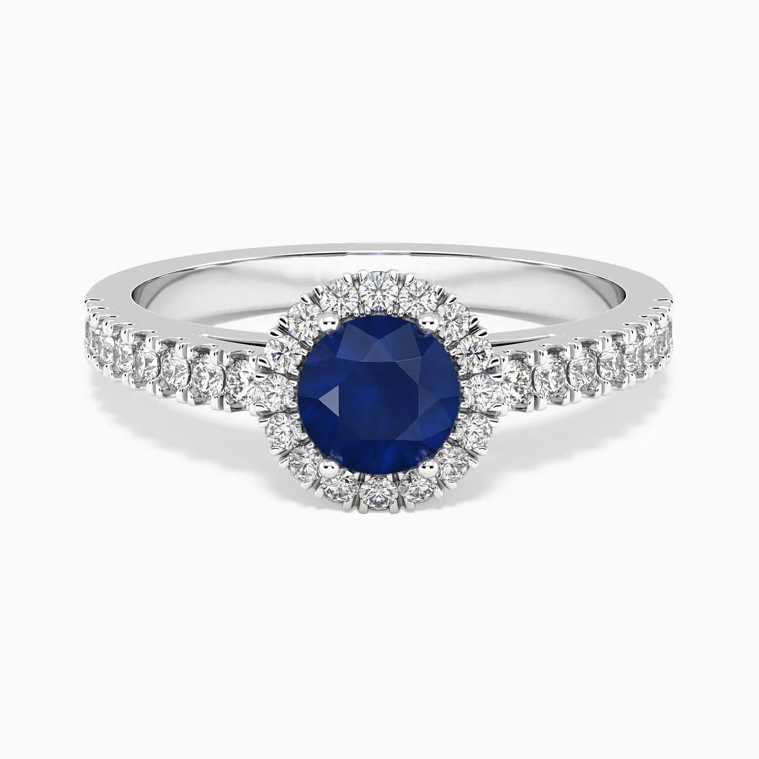 Classic round sapphire halo ring in sterling silver