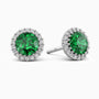 Sterling silver halo stud earrings with a 6 mm lab-created emerald center and a halo of diamond stimulant accents.