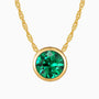 18K gold-plated slider necklace featuring a round-cut emerald in a sleek bezel setting