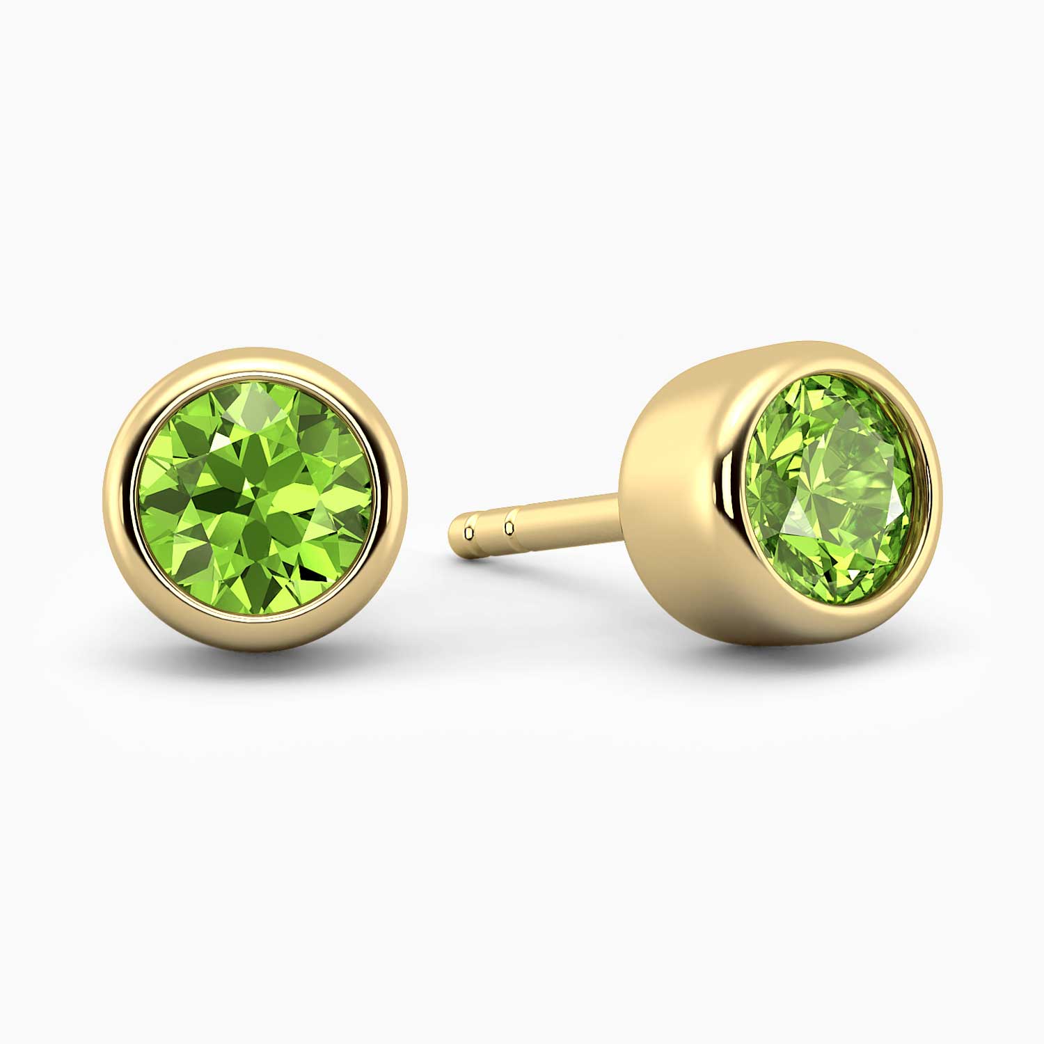 bezel set peridot stud earrings in 18K gold 