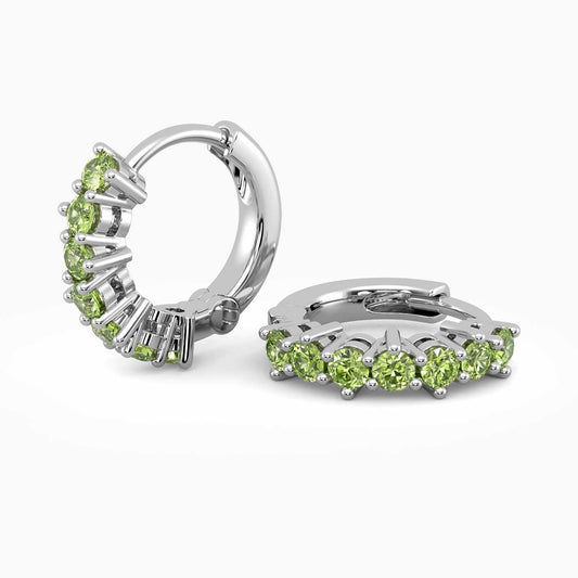 Peridot Silver Huggie Earrings in elegant round shape with natural gemstones, August birthstone set in rhodium-plated sterling silver.