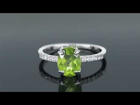 Video showcasing the Oval Peridot Silver Ring with Sparkling CZ Side Stones