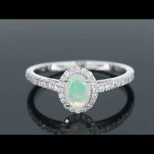 video of opal oval ring with halo