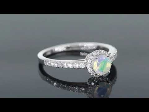 video of round cut opal ring