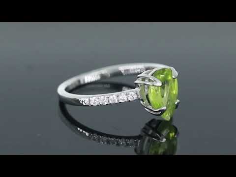 Video preview of Pear Cut Peridot Ring, demonstrating its sleek design and vibrant August birthstone in stunning detail.