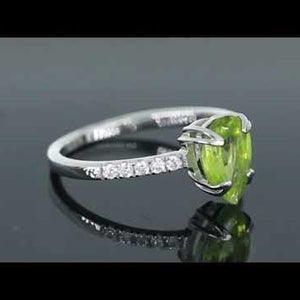 Video preview of Pear Cut Peridot Ring, demonstrating its sleek design and vibrant August birthstone in stunning detail.