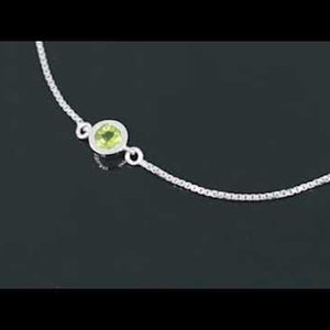 Video showcasing Bezel Set Peridot Bracelet with Adjustable Slider Clasp