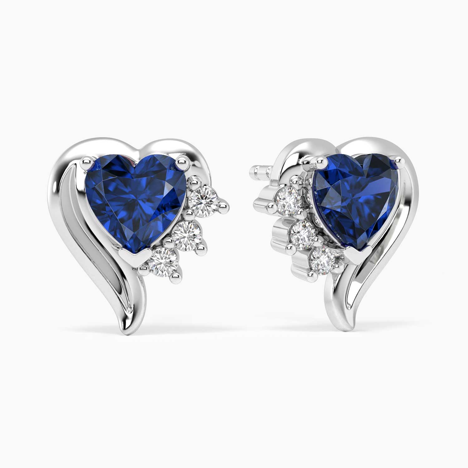 blue sapphire heart earrings in silver