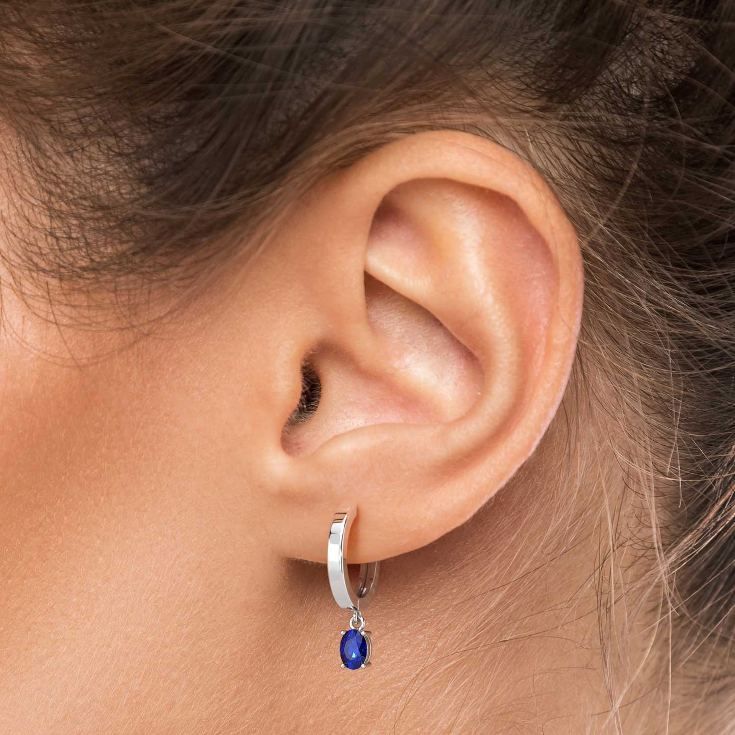 sapphire hoops on model ear