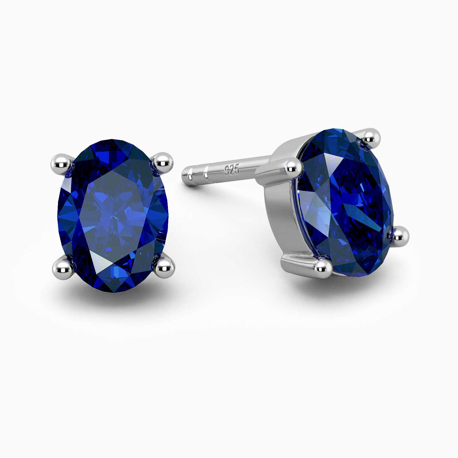 Elegant oval blue sapphire earrings in sterling silver