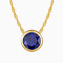 Bezel set round sapphire necklace in 18K gold